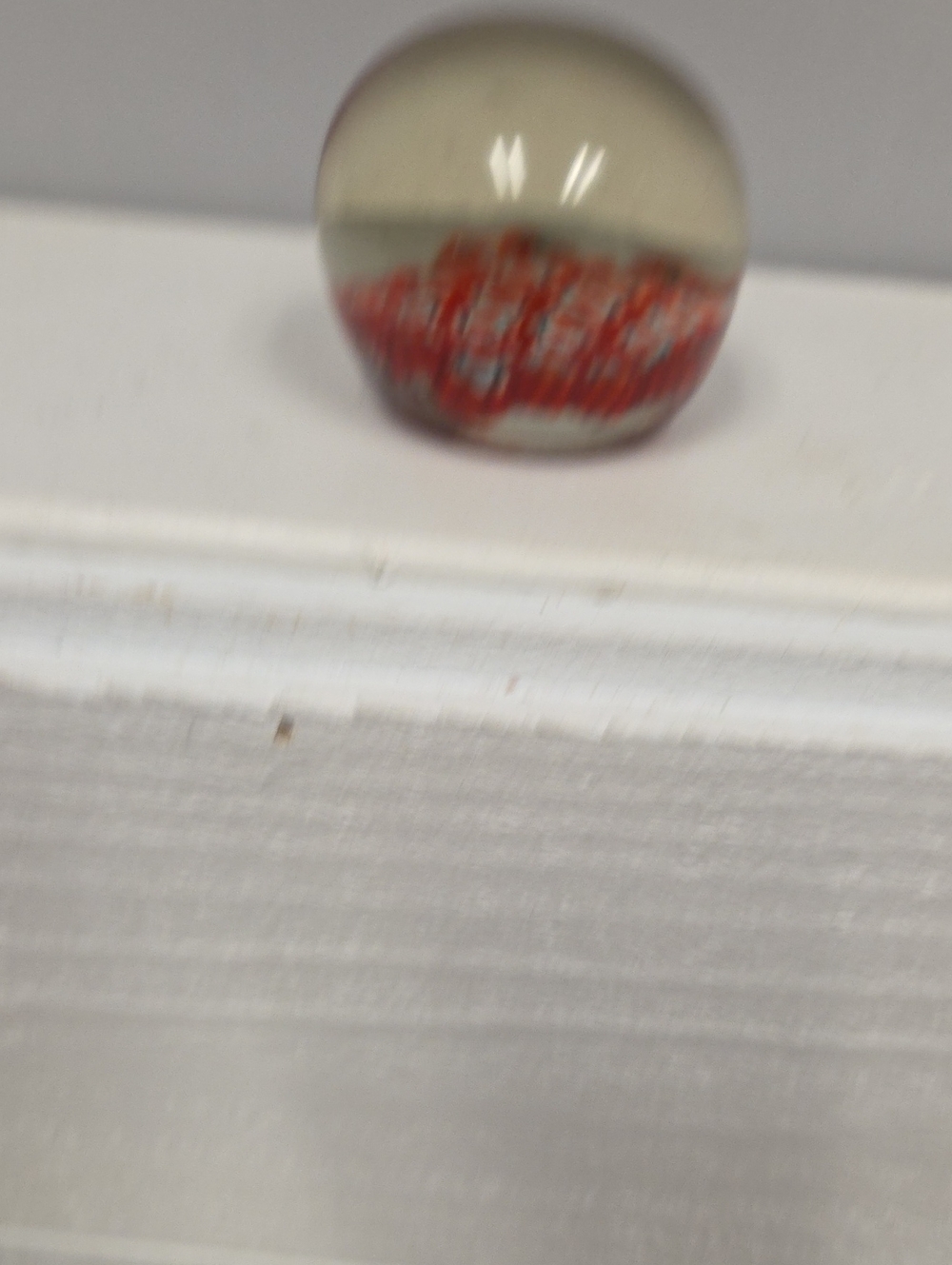 Handcrafted Clear Glass Paperweight with Red Swirl Accent